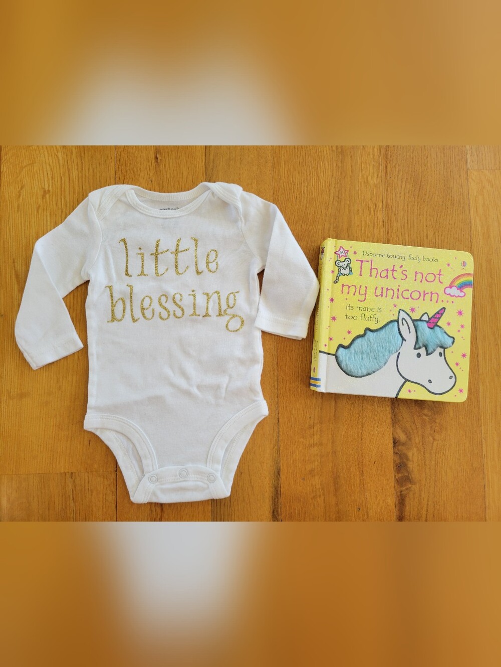 New baby items - onesie and book. Great gift!